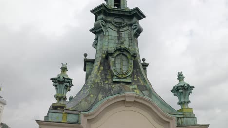 aerial drone view footage of latin cathedral church dome in city lviv ukraine, cloudy sky background