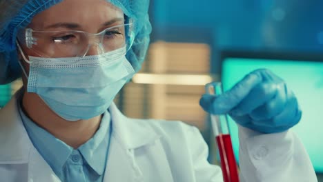 scientist performing blood analysis in a laboratory