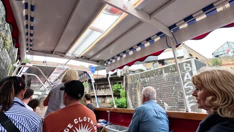 passengers enjoy scenic canal boat tour