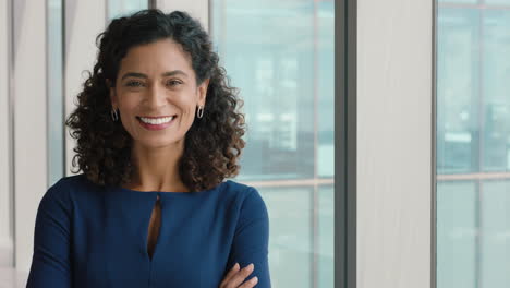 portrait-confident-business-woman-smiling-with-arms-crossed-successful-female-office-executive-enjoying-career-in-corporate-leadership-company-manager-at-work