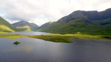 lake surrounded by beautiful mountains 4k