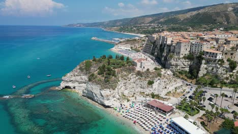 tropea beache and coastal village on top of cliffs in calabria, italy - aerial 4k