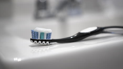 close up of toothbrush with paste