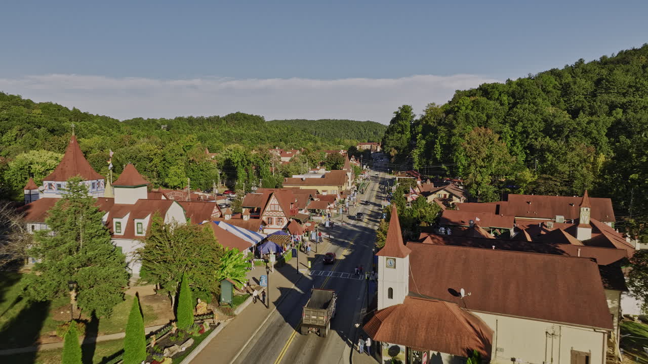 Helen Georgia Aerial v8 cinematic low drone flyover small mountain town along the main street capturing charming Bavarian-style architectures and lush greenery - Shot with Mavic 3 Cine - October 2022