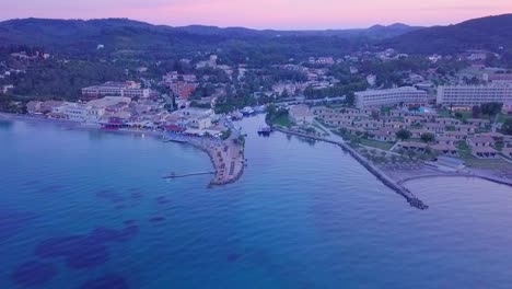 greece, corfu island, drone footage of a beautiful sunset over messonghi beach