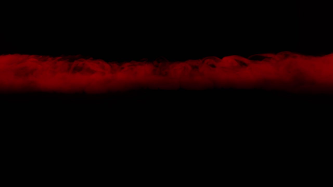A thick trail of red smoke or vapor moves across a black background, ideal for transitions or as a dynamic element in projects