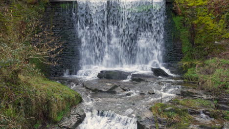 a beautiful waterfall water moving over rocks