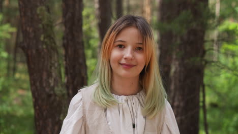 teenage girl with dyed hair in clothes of medieval period