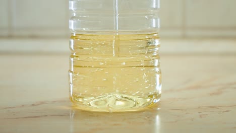 macro shot of collection and recycling of used household edible oil