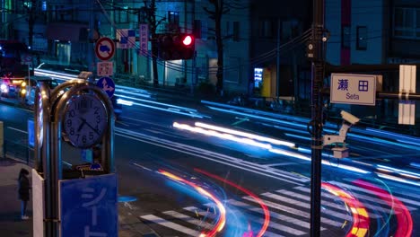 a night timelapse of the traffic jam at the city street in tokyo