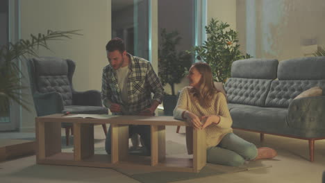 husband and wife assembling table