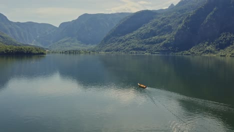 serene alpine lake with wooden boat