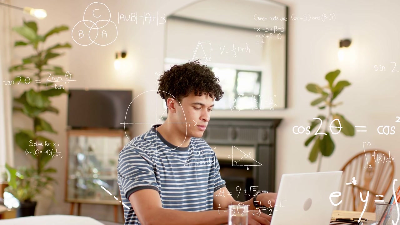 Man typing on laptop in home study, white math diagrams appearing and spreading, aiding studying