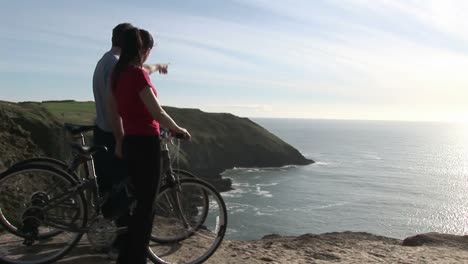 two people looking at cliff