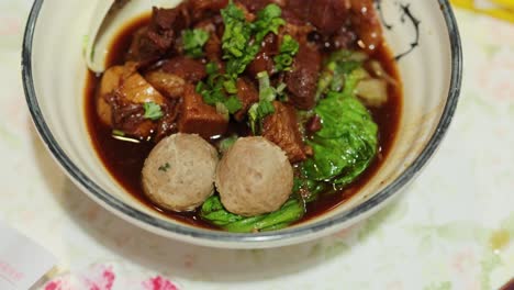 bowl of beef, vegetables, and broth