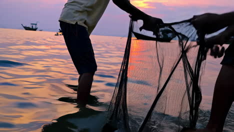 fishermen at sunset