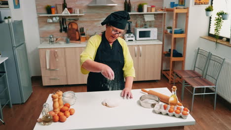 Adding-sifted-flour-on-the-dough