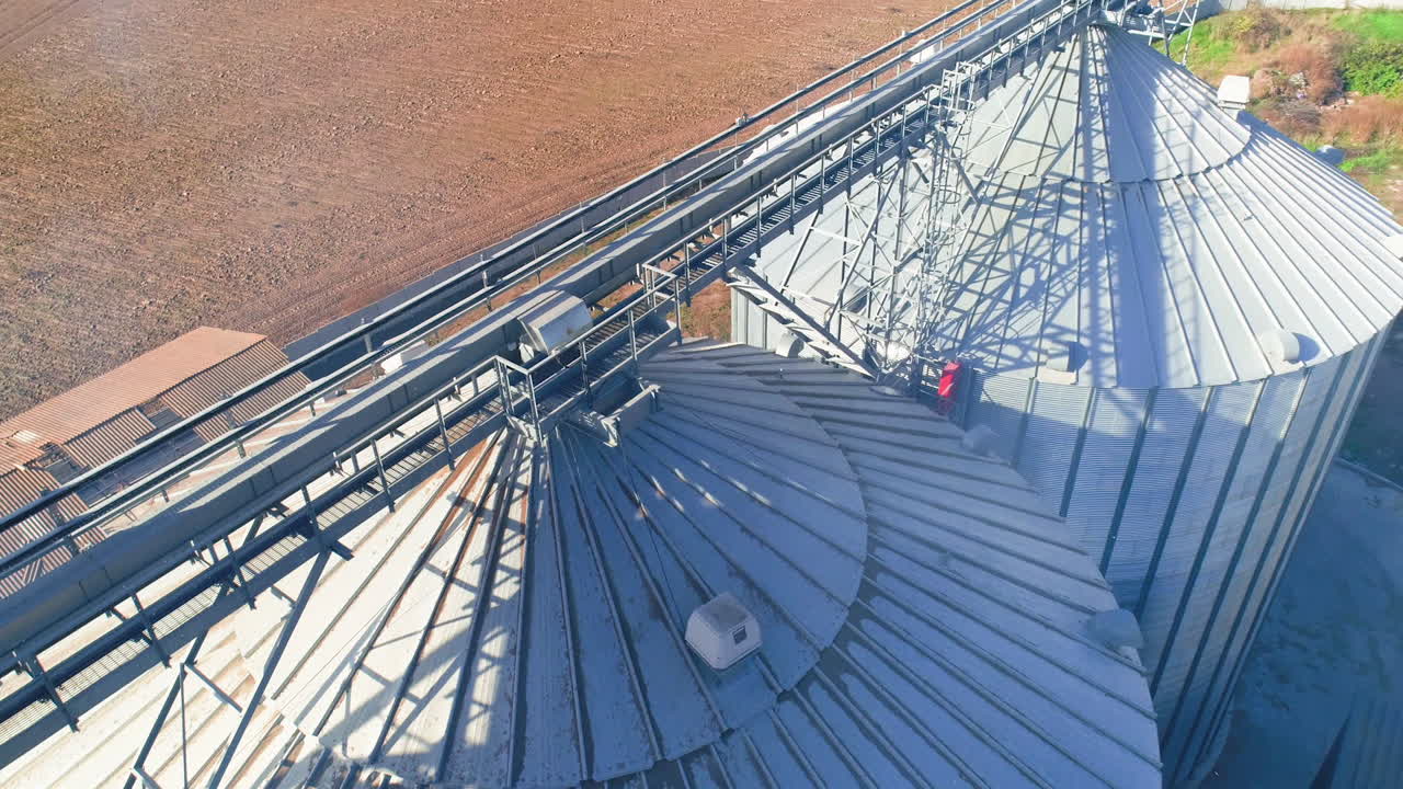 Farming elevator and granary. Storage of grain and other different cereals. Aerial view