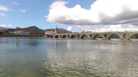 Flying-Over-River-Lima-in-Ponte-de-Lima-city-in-Portugal