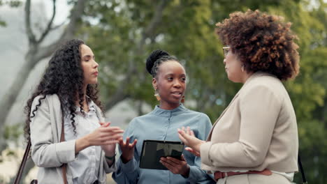 tablet, meeting and business women in park