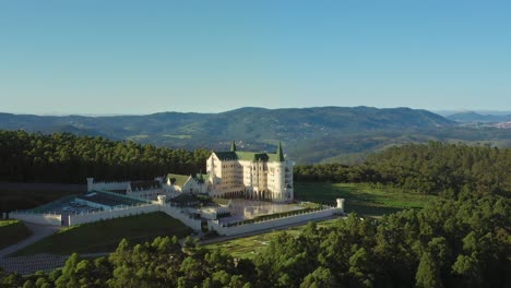 drone flying around medieval style catholic monastery located on the mountain top