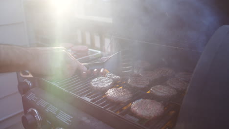 grilling burgers and sausages on a summer day
