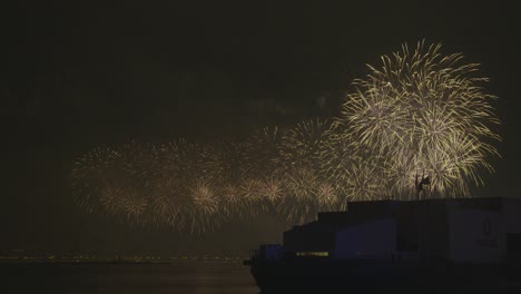 spectacular fireworks display over water at night