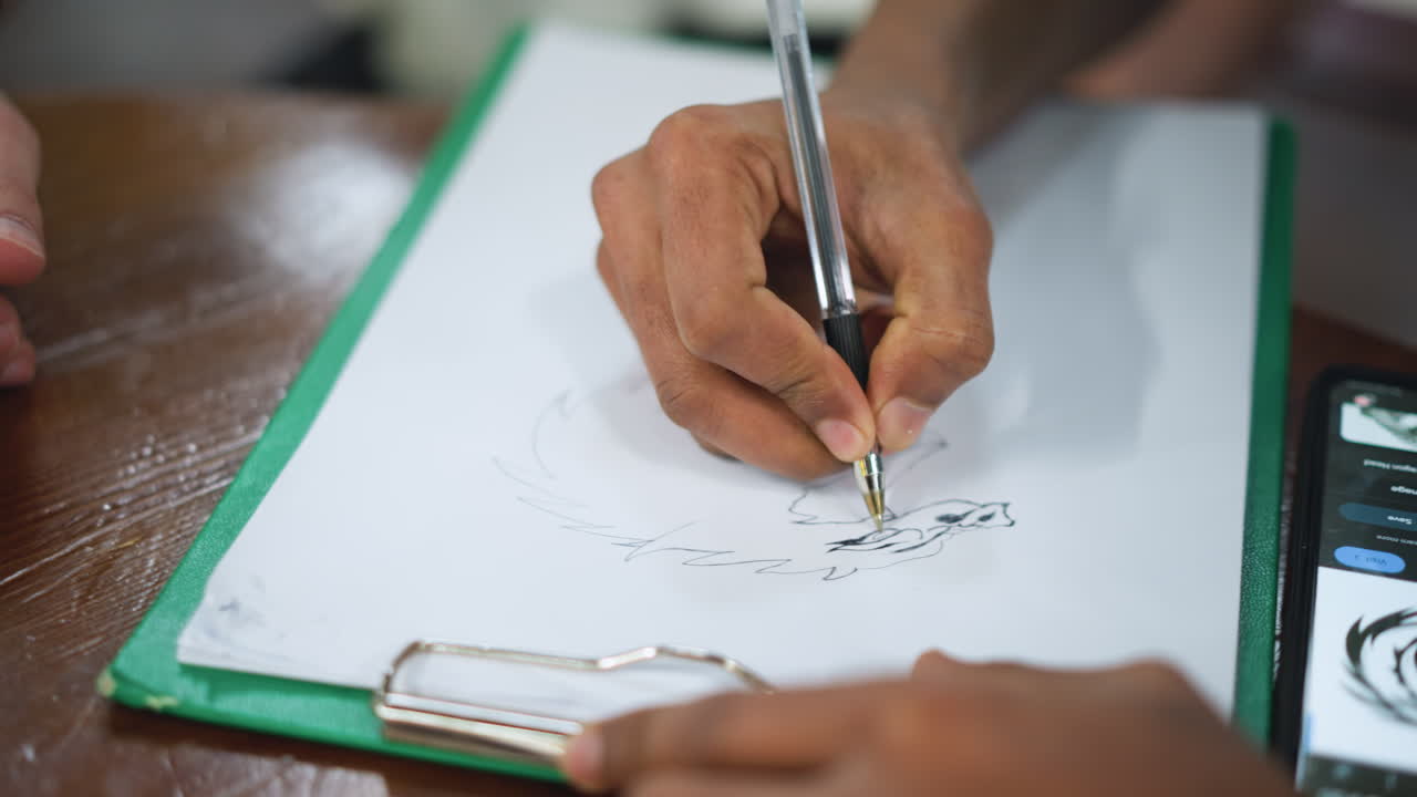Nearer glimpse of detailed eagle sketch on paper under soft natural light highlighting fine feather lines and intricate shading hands poised to refine strokes capturing artistic process nuance work