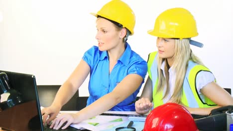 Architect-women-working-together-in-office