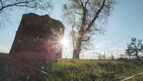 ruined brick tower in rural landscape