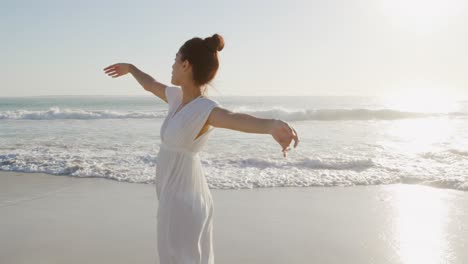 young woman by the sea