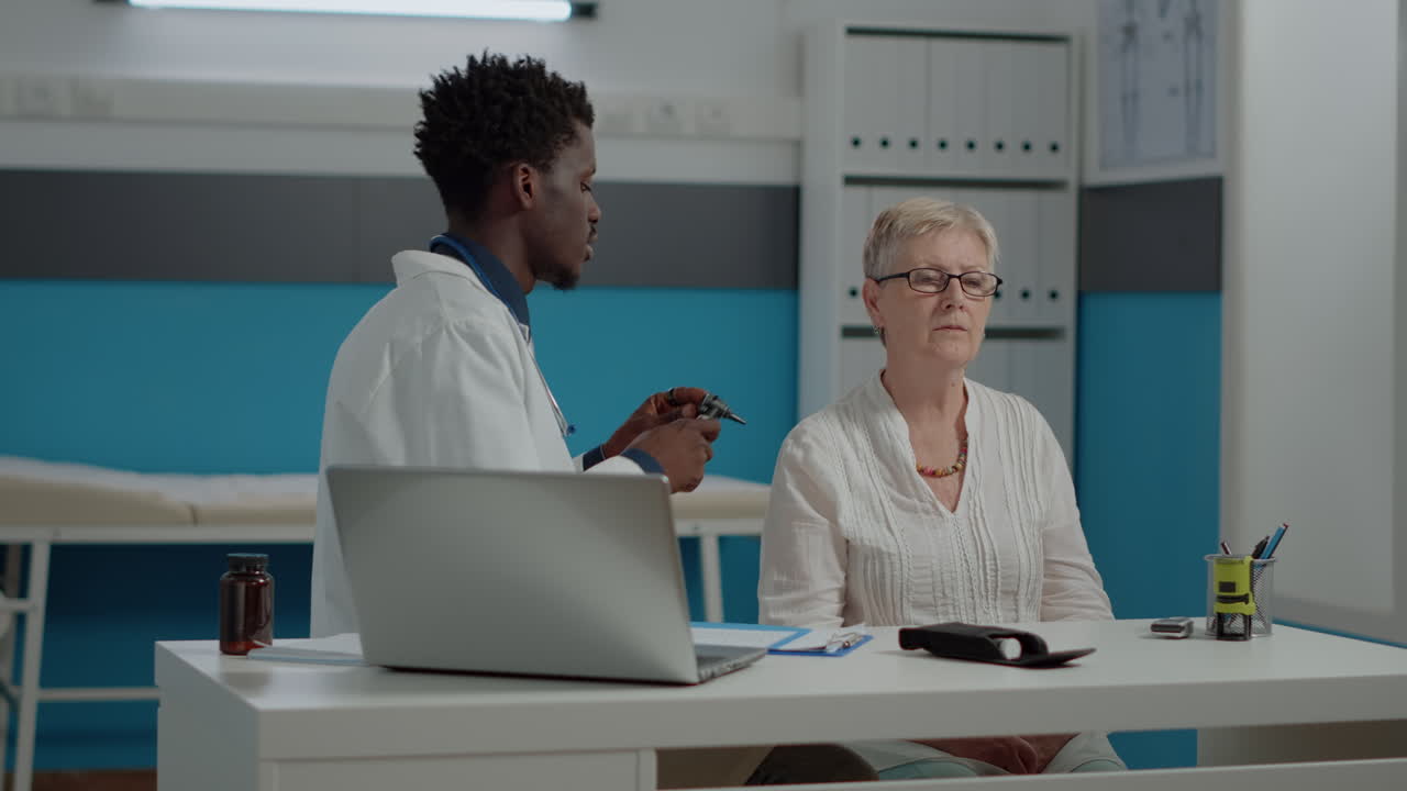 Medical consultation with doctor and patient