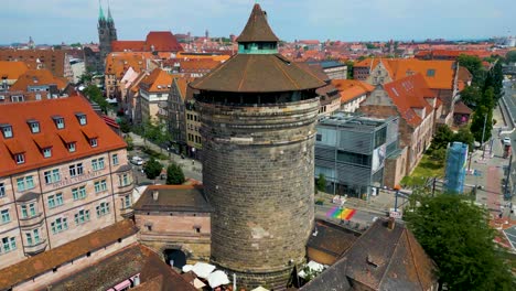 4k aerial drone video of ancient women's gate tower in downtown nurnberg, germany
