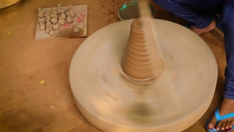 potter at work makes ceramic dishes. india, rajasthan.