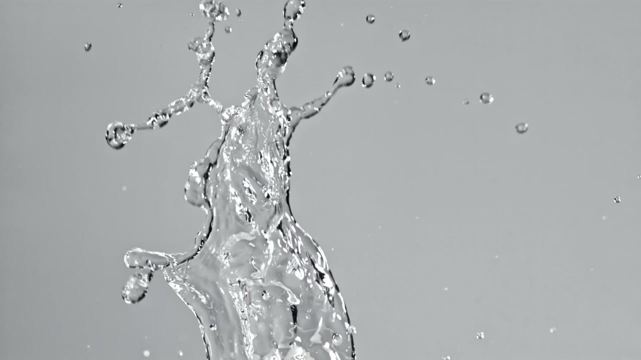 Dynamic Water Splash with Droplets on Gray Background