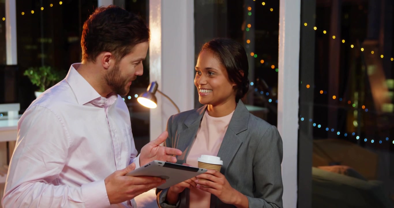 Business colleagues tapping tablet and unveiling subscribe and notification icons for demo
