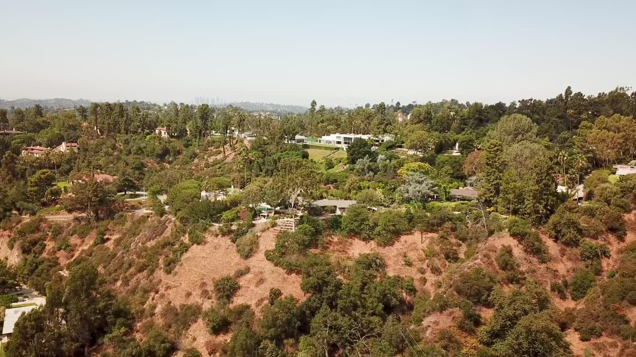 Aerial wide shot of luxury villas and mansion on hill of Angeles national forest. Pasadena city, California. Expensive mansions with beautiful view on Los Angeles