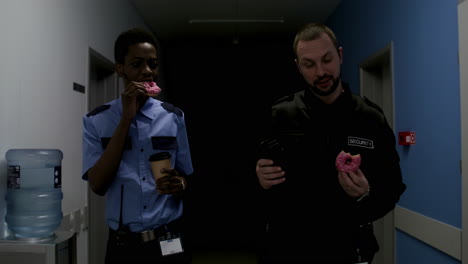 Team-in-uniform-relaxing-on-the-corridor