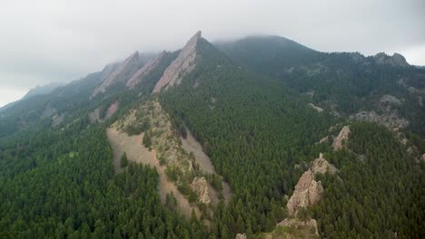 Aerial-orbit-view-of-Flatirons-mountain-range,-Rocky-Mountains,-Boulder,-Colorado