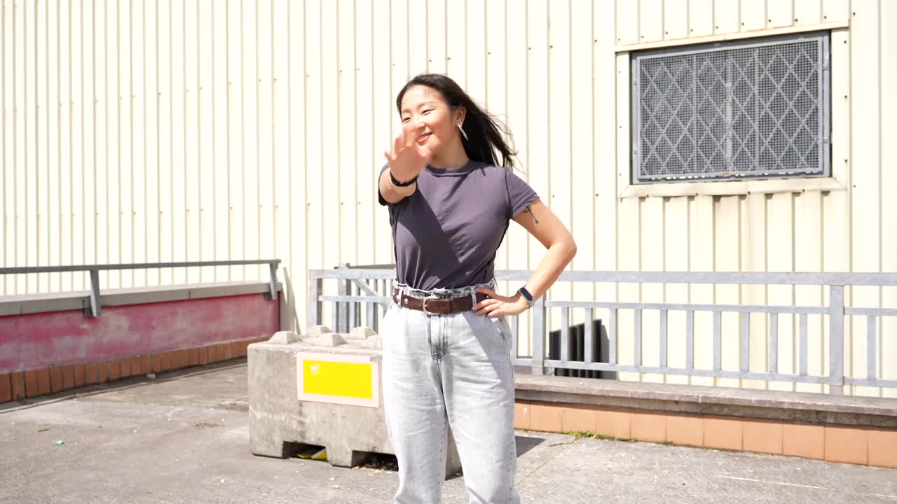 A woman dancing outdoors