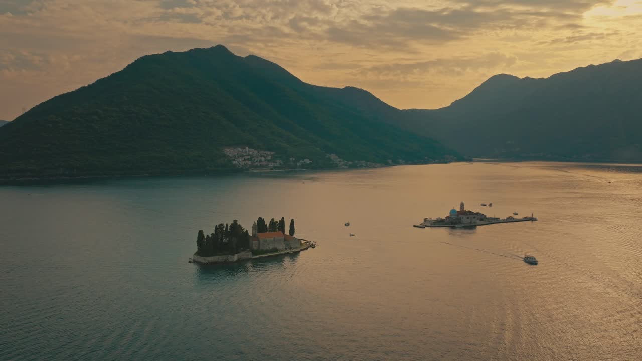 Scenic sunset view of islands near Perast, Montenegro, with serene waters