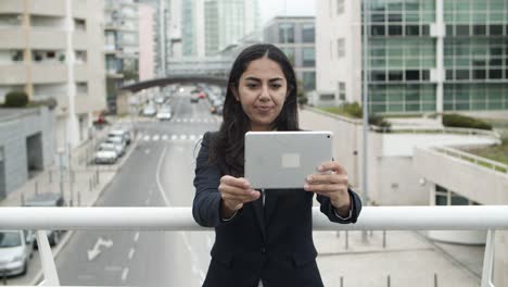 Smiling-businesswoman-having-video-chat