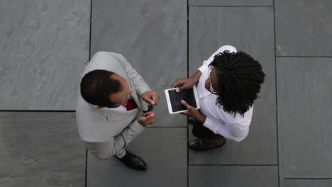 top view of two managers talking outdoor