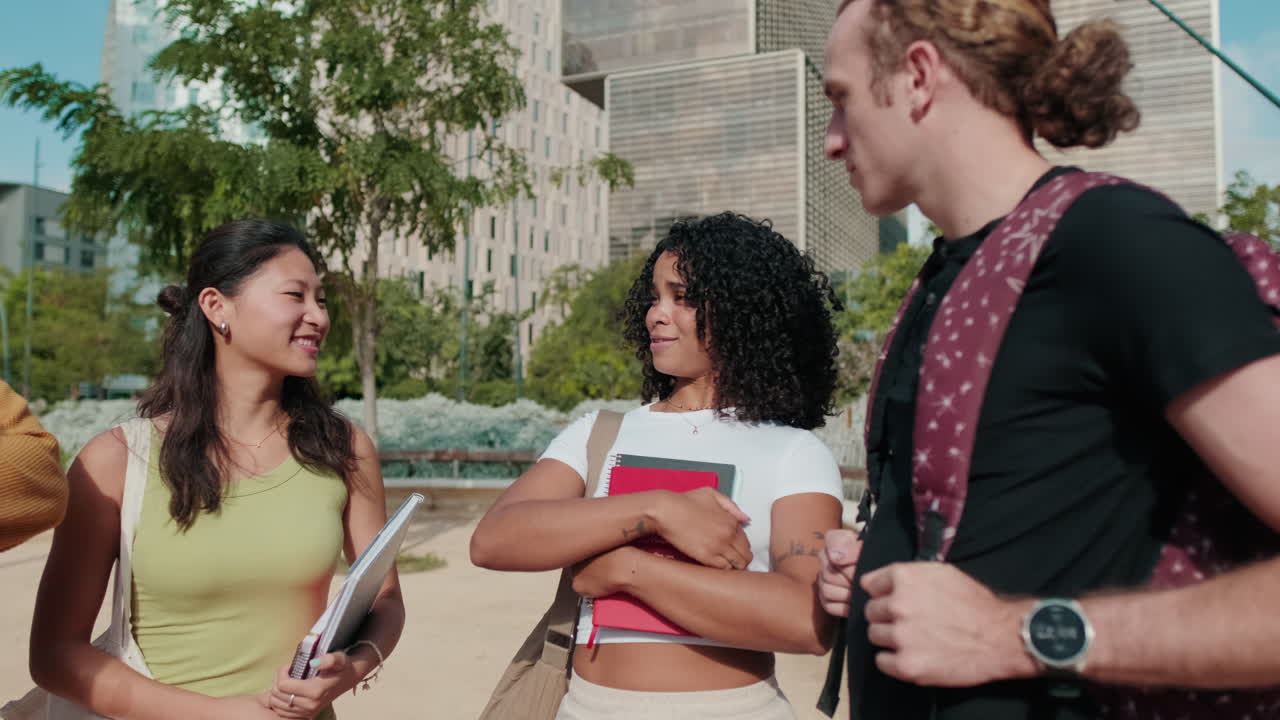 Millennial group of happy students, boys and girls with backpacks, books,
