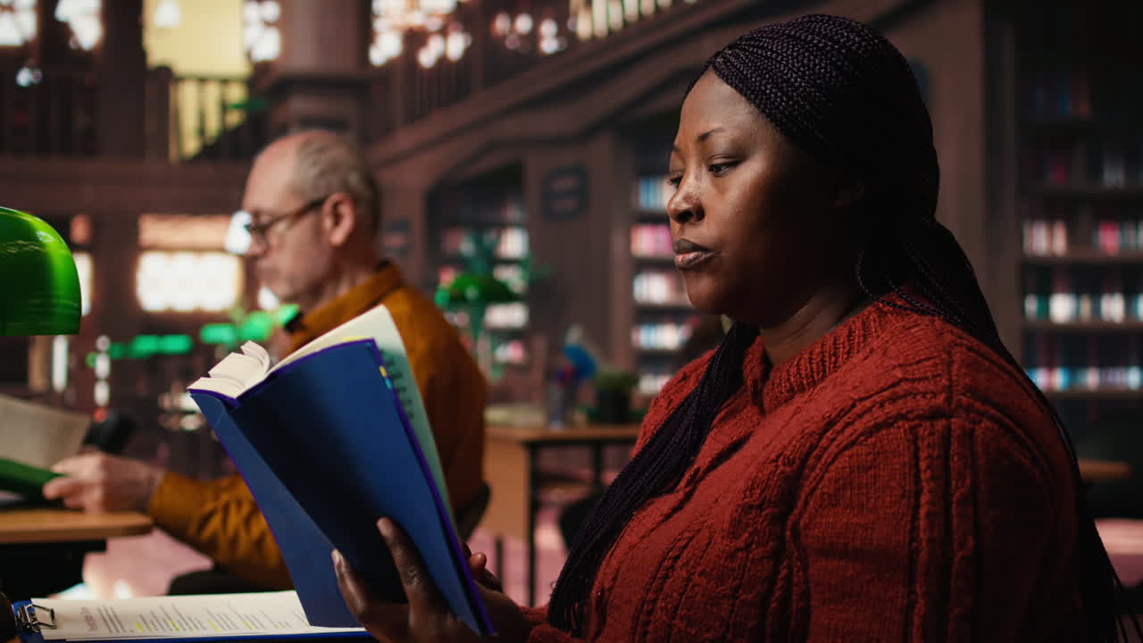 People reading books in a library