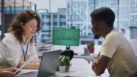 hr manager conducting a detailed interview with a potential candidate