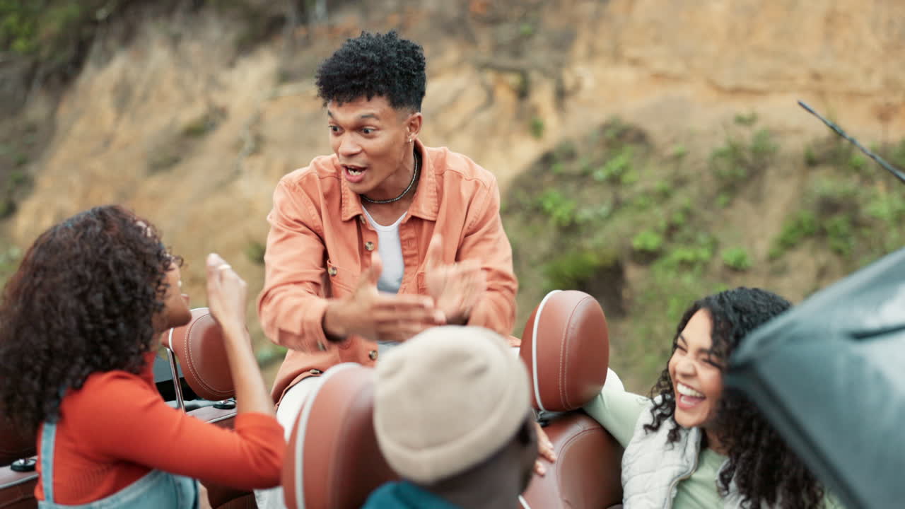 Friends enjoying a fun road trip in a convertible