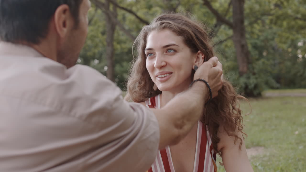 Woman Drinking Wine with Man