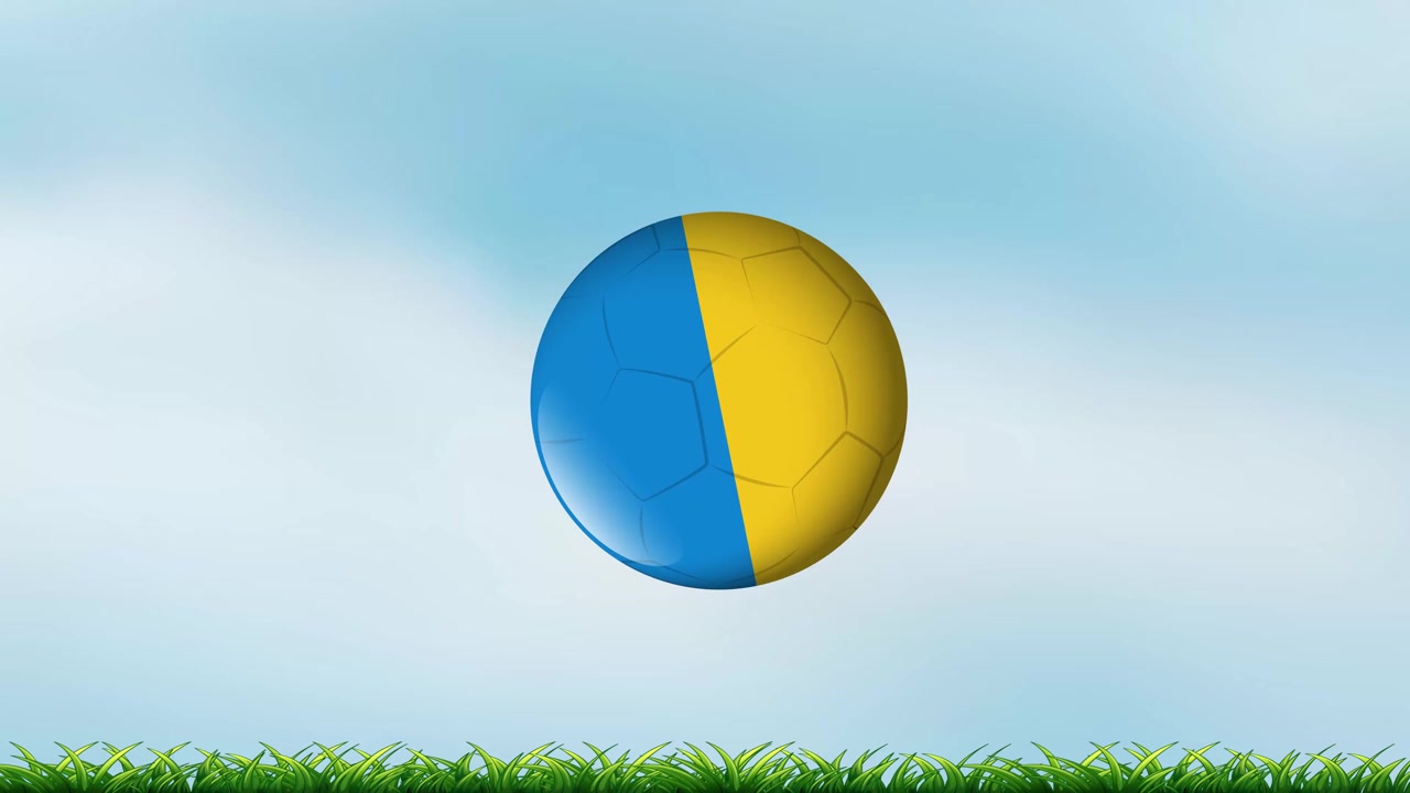 Jalkapallo Ukrainan lipun väreillä vierii nurmikentällä.