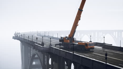 crane on a foggy bridge